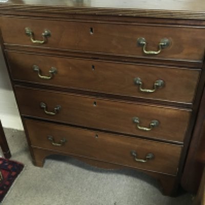 A George III mahogany chest of drawers fitted with a flight of four graduating drawers. 80cm wide ( No Reserve).