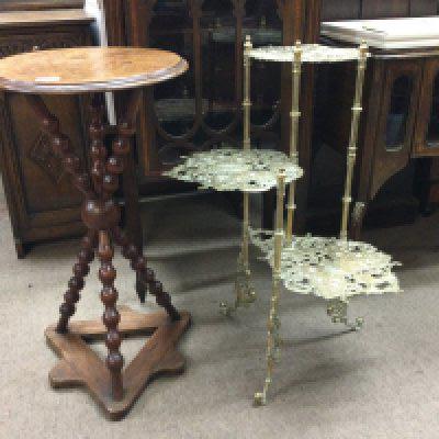A three tier brass plant stand and a mahogany Gypsy table .