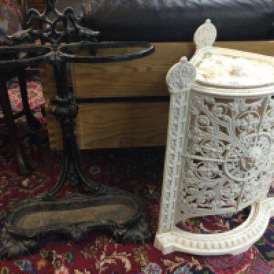 Two cast iron stick stands .