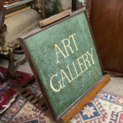 A 1940s floor standing Art Gallery sign and easel.