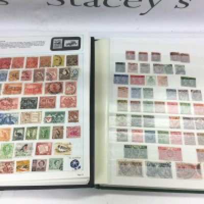 Two boxes of mixed world stamps and first day covers. Shipping category D.