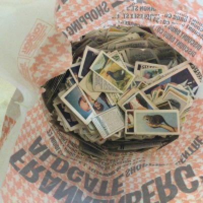 A bag containing cigarette ads various.