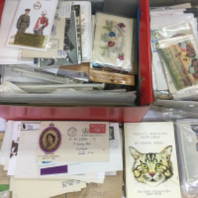 A box of stamp covers, postcards etc. Shipping category C.