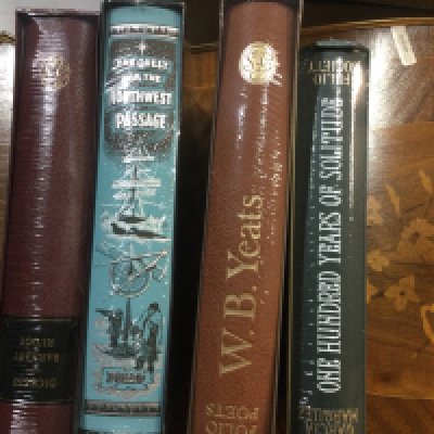 A collection of books including Folio Society.