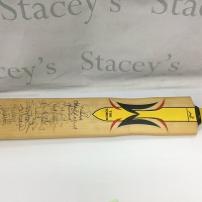 A signed cricket bat. Shipping category C.