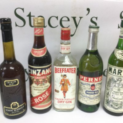 Eleven bottles of wine and spirits. Shipping category D.