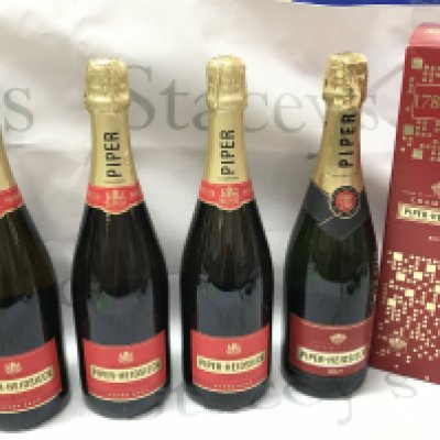 Four bottles of Piper Heidsieck Champagne , one boxed. This lot cannot be posted