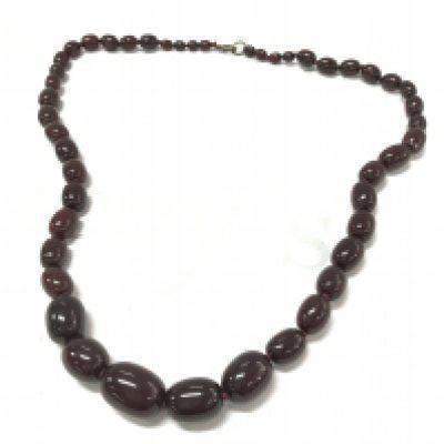 Cherry red coloured amber style necklace ,130g 91cm . Postage category A