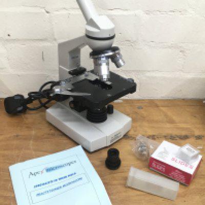 An Apex Practitioner Microscope. Postage category C- NO RESERVE