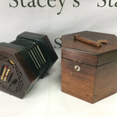 A C Wheatstone of London concertina with outer case. Shipping category D.