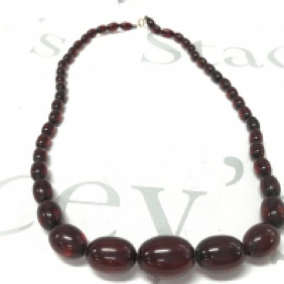 Cherry amber coloured Bakelite style necklace , 45g 65cm. Postage category A
