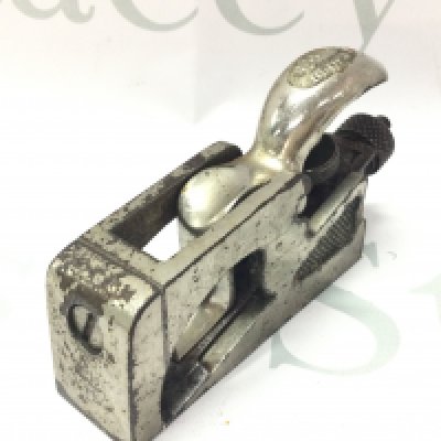 A small vintage record silver plated wood plane . Postage category a