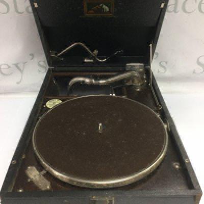 A portable HMV gramophone. Shipping category D.