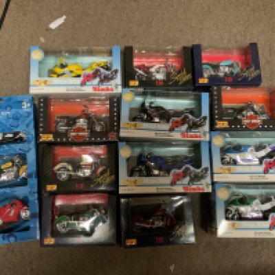 A small collection of Simba and Maitso boxed model motorcycles