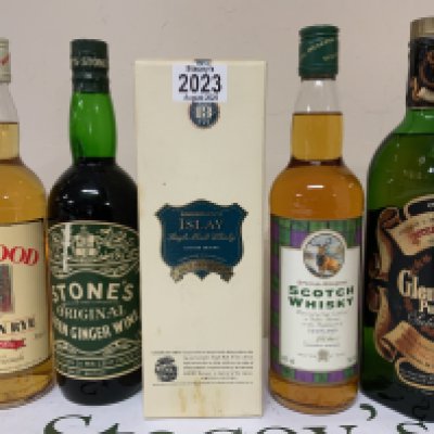 4 Various bottles of Whisky plus Stones Ginger Wine.