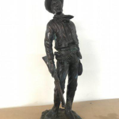 A cold cast resin Western Cowboy figure ,46cm tall. Postage category C- NO RESERVE