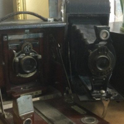 Two folding cameras.