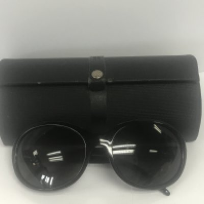 A pair of ladies Mont Blanc sun glasses in a case