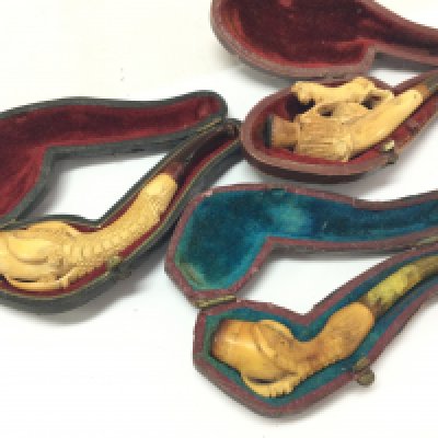 Three Victorian small meerschaum pipes carved and in original cases