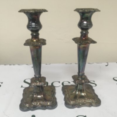 A pair of silver plated Candle sticks. Height 28cm