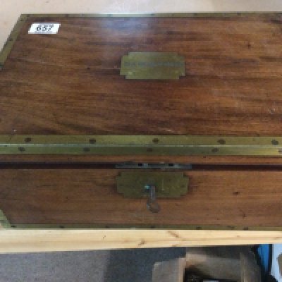 A mahogany campaign brass bound writing slope with a fitted interior.
