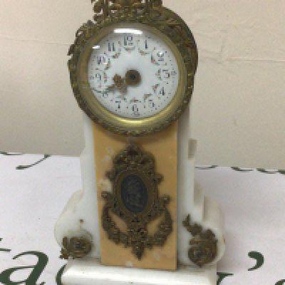 A French white marble clock with gilt metal punts for restoration. Hight 22cm