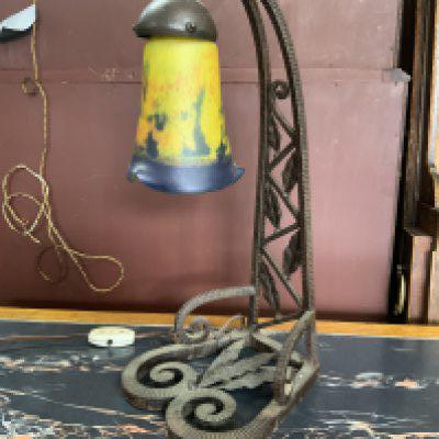 A French art deco wrought iron table lamp with pate de vere tulip glass shade.