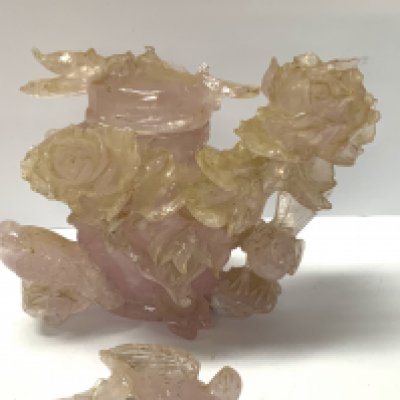 A carved Rose Quartz carved lidded pot with rose and bird decoration. (A/F)- NO RESERVE