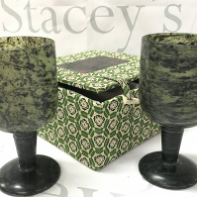 A pair of boxed spinach jade goblets, 12cm tall. This lot cannot be posted