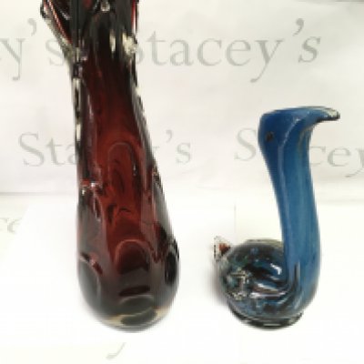 A Murano style glass vase and a tall red glass vase.