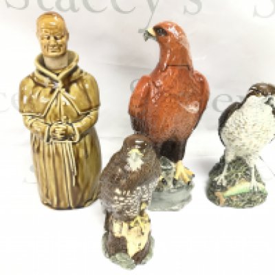 A collection of whisky bottles made by Beswick. Included one still sealed. Postage D