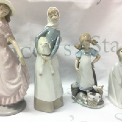 Three Lladro porcelain figures and a zaphir Figure . This lot cannot be posted