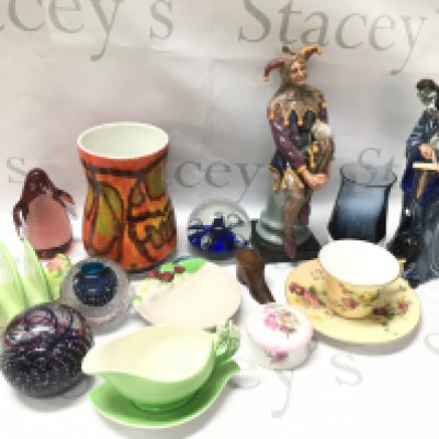 A collection of various ceramics including Royal Doulton Wizard and Jester figures, Royal Worcester cup and saucer, paperweights, Poole vase, Royal Winton Etc . This lot cannot be posted