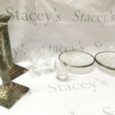 Crystal cut glass bowls with silver hallmarked rims, fruiting vine glasses , a pair of silver plated Corinthian candlesticks (29cm tall) This lot cannot be posted