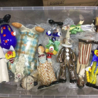 A large collection of Elizabeth Haslam pottery clowns plus some Murano glass clowns. Shipping category D.