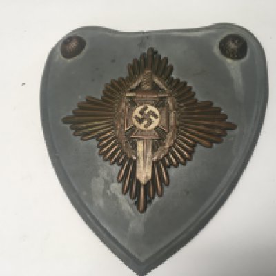 A rare and appearing to be authentic German NSKOV standard bearers Gorget. the condition in keeping with age with later drill holes possible previously mounted on a plaque.