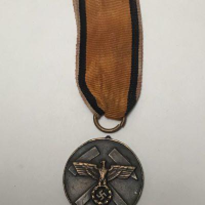 A rare German Third Reich Mine Rescue Medal with ribbon detached top ring.