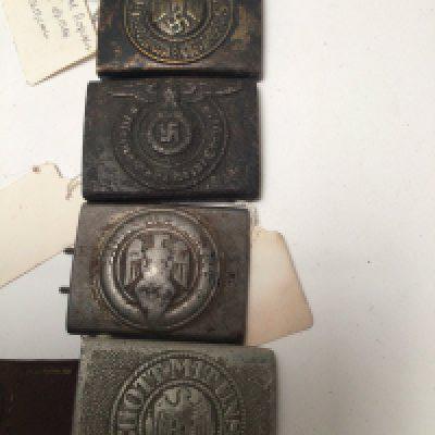 Four German Third Reich belt buckles including Hitler Youth SS and Army buckles. (4)