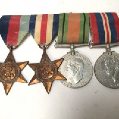 A group of II world war medals 1939-45 star France & German star Defence and Victory medal (4)