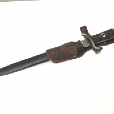 A good example of a German Hitler Youth dress bayonet with enamel decoration. Marks to the blade leather frog black steel scabbard.
