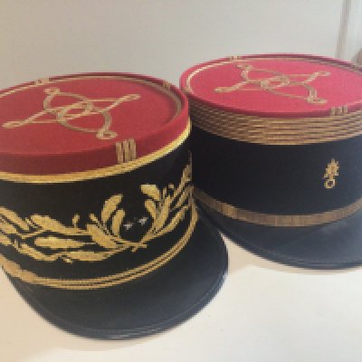 Two French Foreign Legion Kepi hats one with applied gold thread one for a French general with two silver stars.