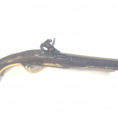 A Nice Example of British Brass barrelled Flintlock 18th century pistol the stock end with applied brass ornamentation the barrel with several proof marks brass trigger guard steel action.