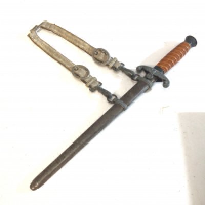 A German Third Reich II world war officers presentation dagger with original hanger the blade with makers stamp.