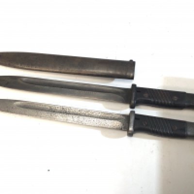 A German Third Reich II world war K98 bayonet the blade etched Alles Fur Deutschland.also stamped with maker&rsquo;s initials WKC. and one other K98 bayonet no scabbard (2)