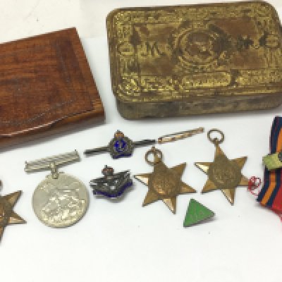 A collection of WW2 medals including Atlantic star, Burma star, 1939-45 star, War medal , RAF pin, Royal Navy pin, enamel youth hostel badge, RFA pin, WW1 Christmas tin. Postage category B