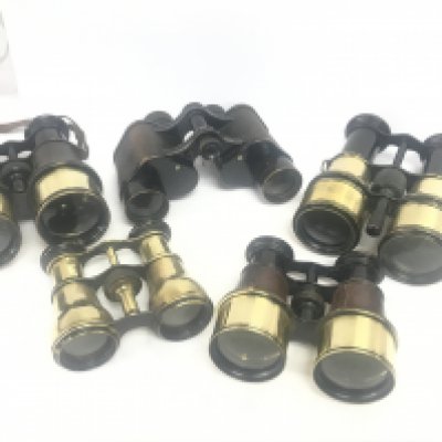 4 Vintage brass binoculars and a pair of military binoculars
