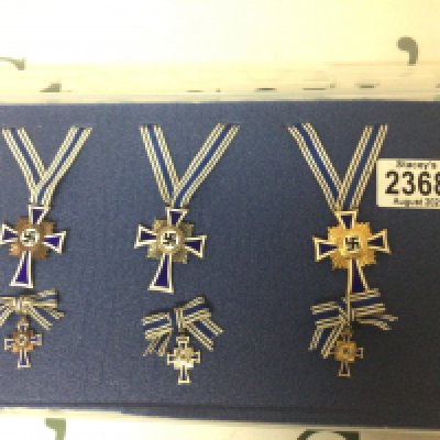 A set of Three German Third Reich Mother Honour crosses Bronze silver and gold with miniatures.