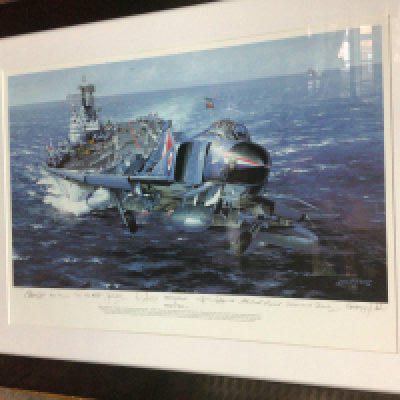A framed coloured print study of HMS Ark Royal by Philip West with several crew signatures.