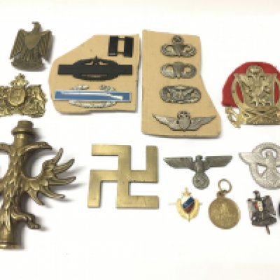 A collection of mixed WW2 badges included some Third Reich, postage category B
