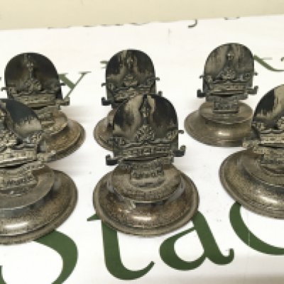 A rare and interesting set of six British Royal Navy silver menu holders dated 1917 the silver holders with the badge of the Anson Battalion. These troops where Royal Navy Volunteers who fought land battles.The Seafied boys. Battles included the Siege of Antwerp Salonica The Western Front and the attempt on Sulva Bay Gallipoli. Rare and possible unique silver menu holders.